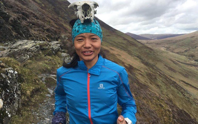 A little bit silly photo of Rai in the UK with a sheep skull on her skull. (Photo credit: Adam Briggs)